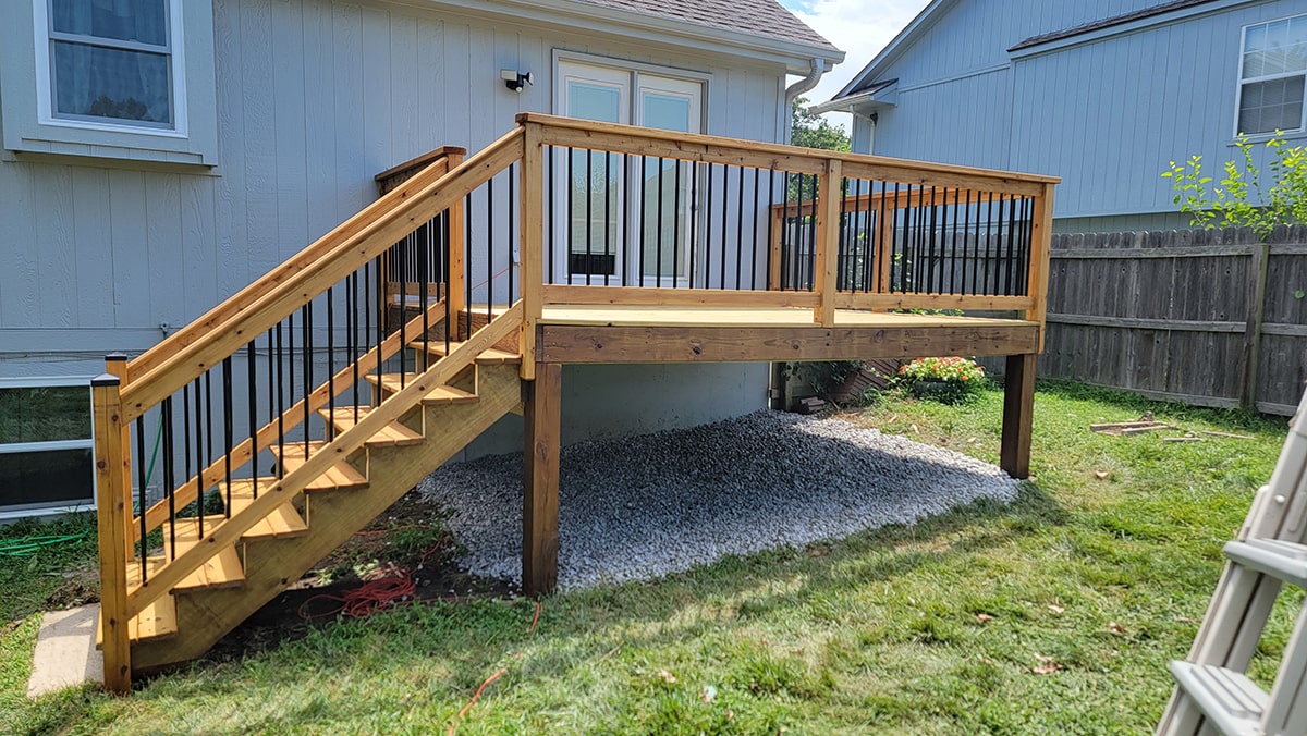 Deck build, stain, and ground grading
