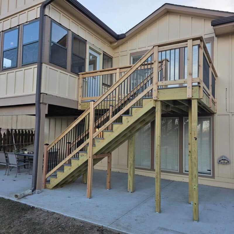 Newly Built Deck with Composite Flooring and a New Exit Door Installation